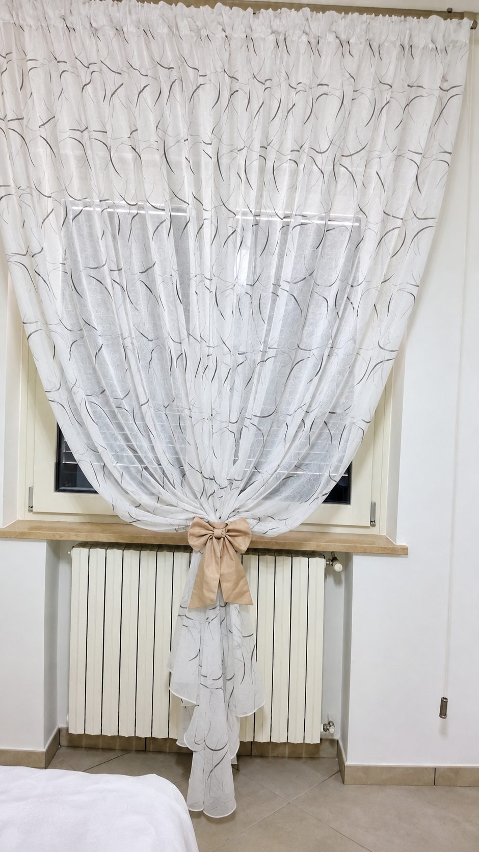 Tenda in voile con fiocco