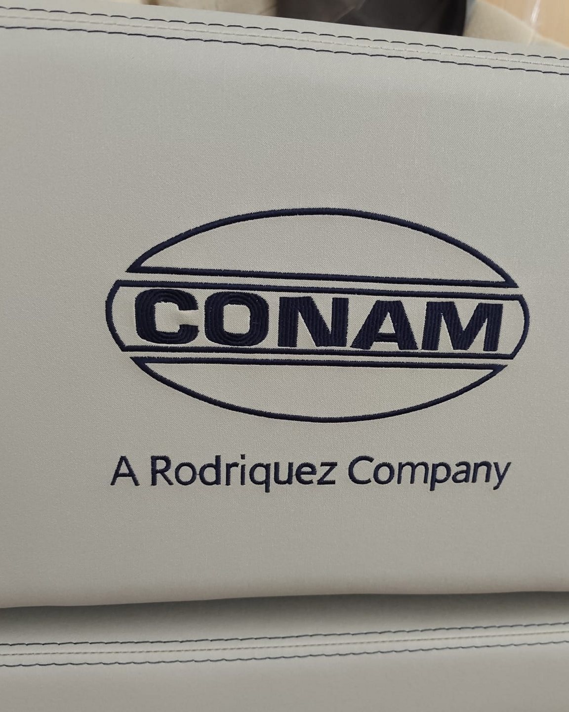 Conam 58, il nuovo logo ricamato