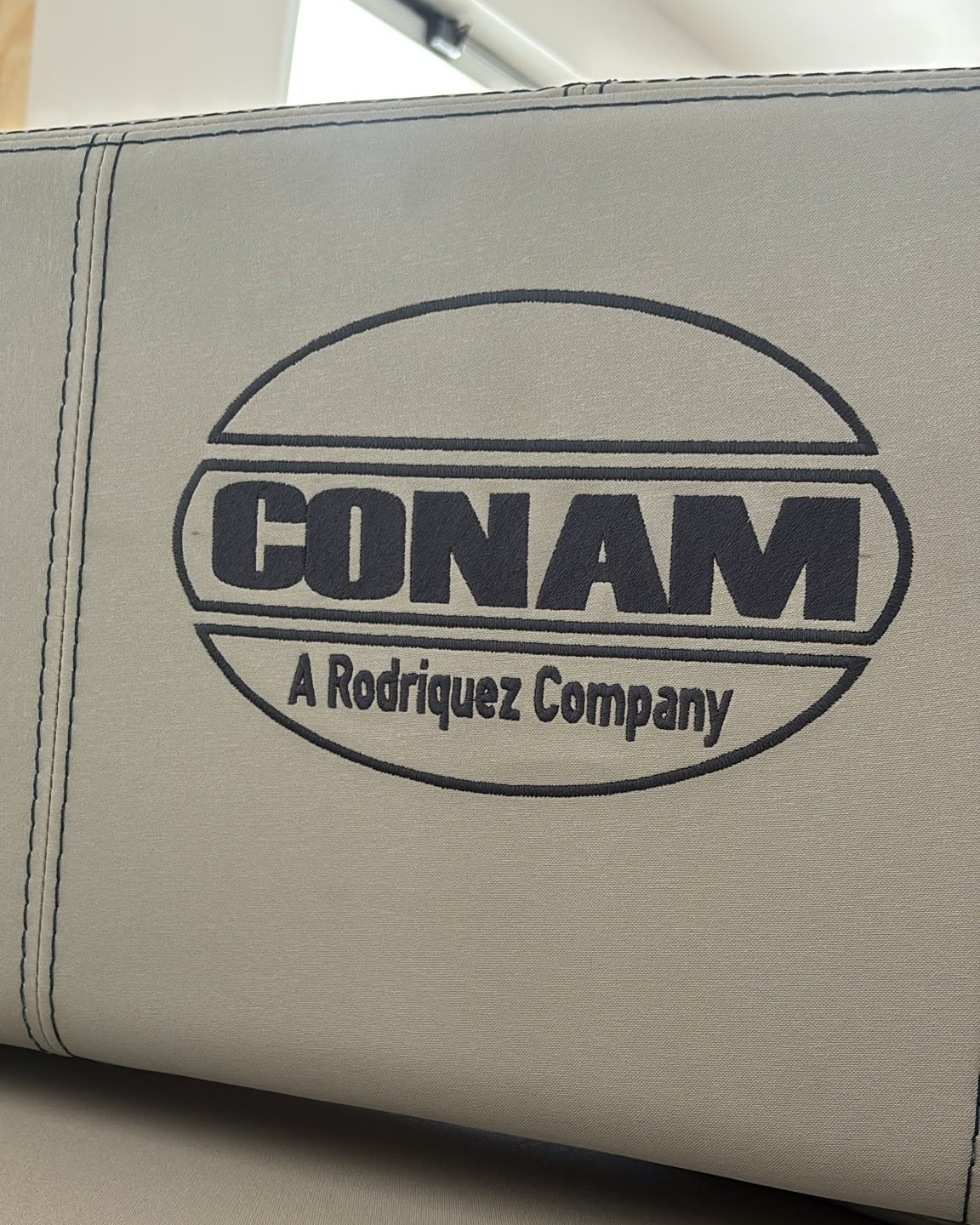 Conam 58, il vecchio ricamo del logo